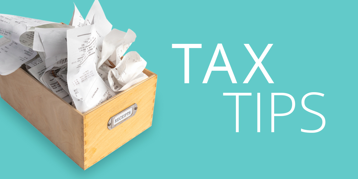Russo CPA Tax Tips Image: A wooden storage box holding receipts and papers.