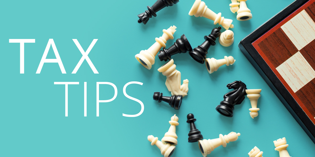 Chess pieces and board symbolizing tax strategy.